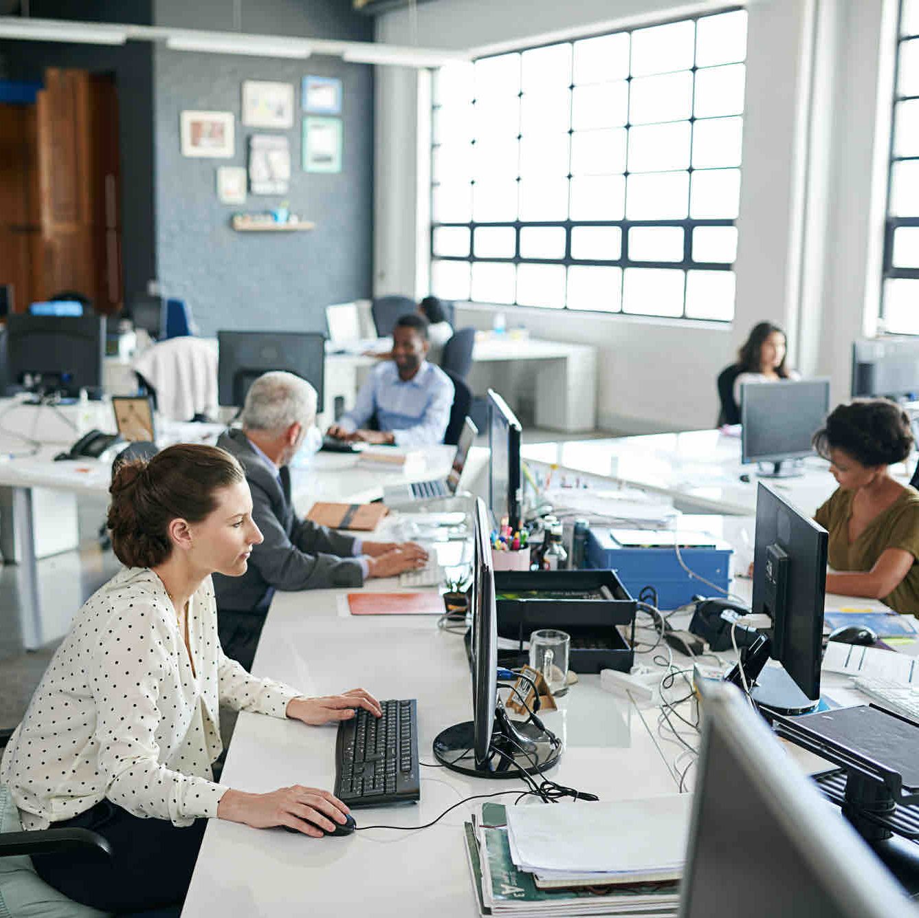 Questyme team working in an office